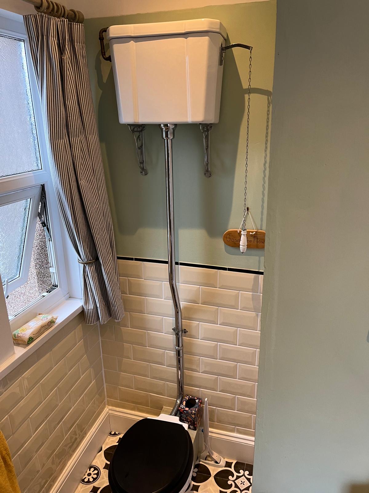 Traditional high-level cistern with chrome pipework